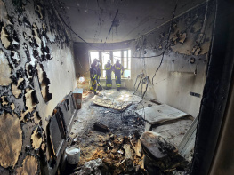 Фасад и окна в жилом доме, пострадавшем после падения беспилотника в Ростове, восстановят